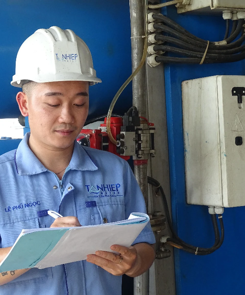 Engineer checking plant equipment